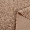 Venta caliente Textiles cálidos 320 GSM 100% Polyester Teddy Fleece Fabrics para ropa de invierno